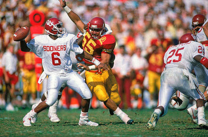 Seau gets after quarterback Charles Thompson in a USC upset of Oklahoma, in 1988.